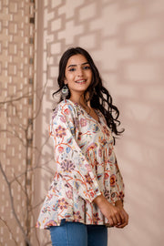 Women Off White Printed V-Neck Peplum Top