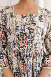 Women Off-White Printed V-Neck Peplum Top