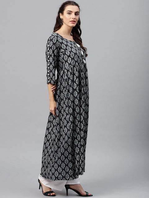 Round neck Black & white printed maxi dress with 3/4 sleeves and Emblished with tassels