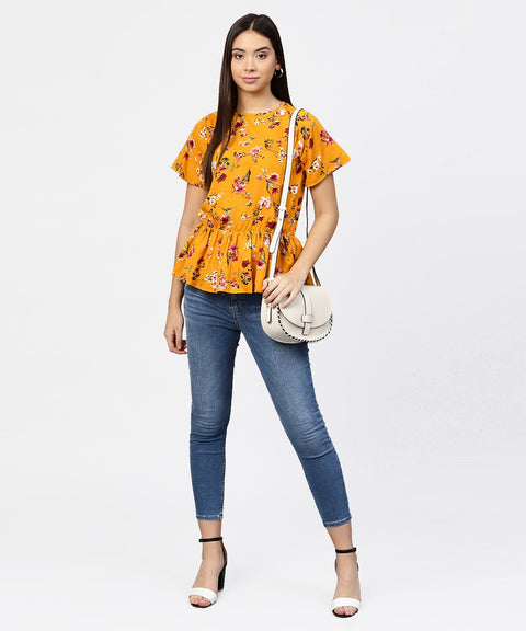 Yellow printed short sleeve with a gathered peplum style top