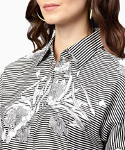 Black printed short sleeve top with shirt collor