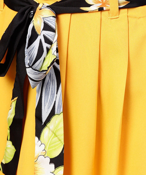 Black printed half sleeve tops with yellow calf length skirt with belt