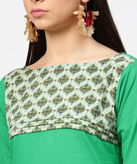 Green yoke printed half sleeve cotton kurta with cream ankle length pallazo
