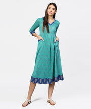 Printed V-neck panelled with patch pockets and 3/4th sleeved Maxi Dress