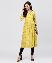 Cotton Mustard Pleated angrakha with v-neck and emblished with tassel
