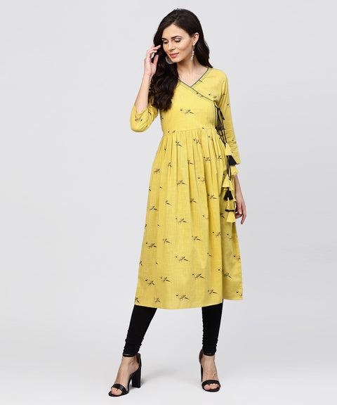 Cotton Mustard Pleated angrakha with v-neck and emblished with tassel