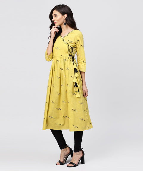 Cotton Mustard Pleated angrakha with v-neck and emblished with tassel
