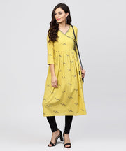Cotton Mustard Pleated angrakha with v-neck and emblished with tassel