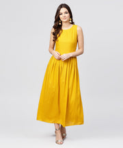 Bright Yellow rayon A-line box pleated Maxi with attached Jacket till Yoke and emblished with tassels