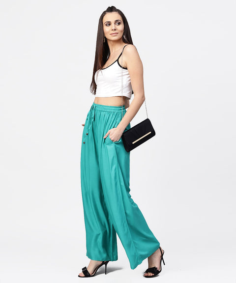 Turquoise blue flared ankle length palazzo