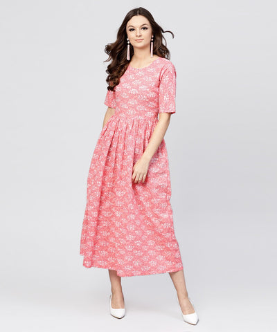 Pink printed dress with round neck and half sleeves