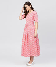 Pink printed dress with round neck and half sleeves