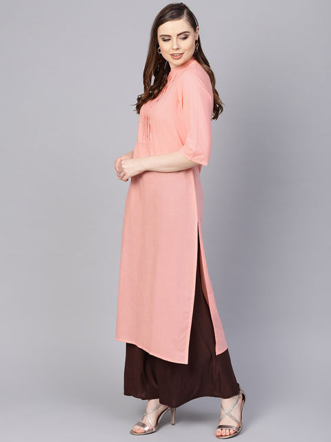 Solid peach kurta with closed collar and pleats in yoke