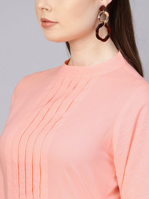 Solid peach kurta with closed collar and pleats in yoke