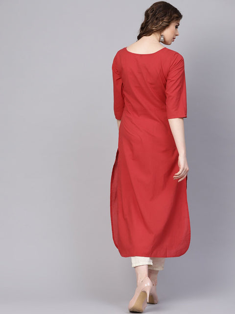 Solid red kurta with thread stitch and tassels detailing with a round neck and 3/4th sleeves