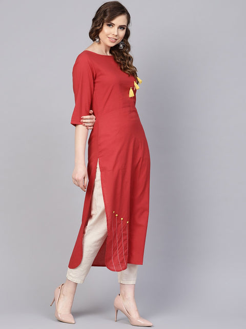 Solid red kurta with thread stitch and tassels detailing with a round neck and 3/4th sleeves