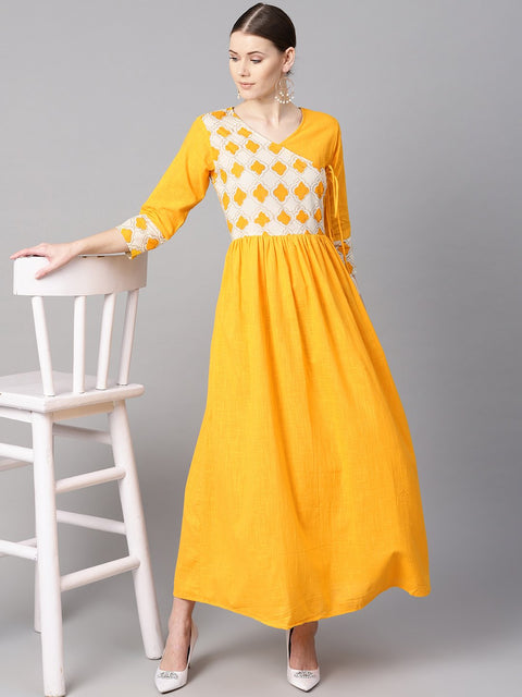 Printed yoke Angrakha style 3/4th sleeve yellow colored maxi.