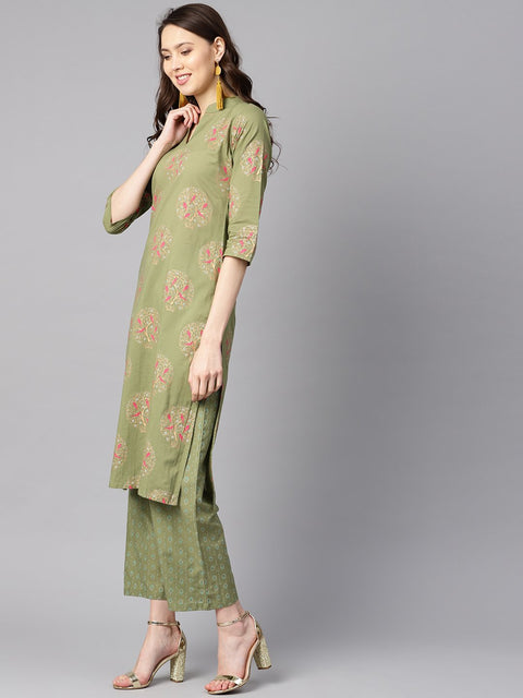 Pista green floral printed 3/4th sleeve kurta with pista green printed pants.