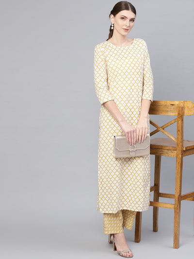 Geometric Cream printed round neck straight kurta with 3/4th sleeves and beige printed pants