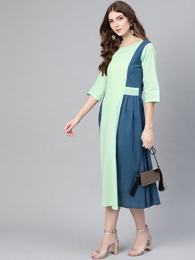 Solid teal blue and pastel pista green round neck with 3/4th sleeves color blocked dress