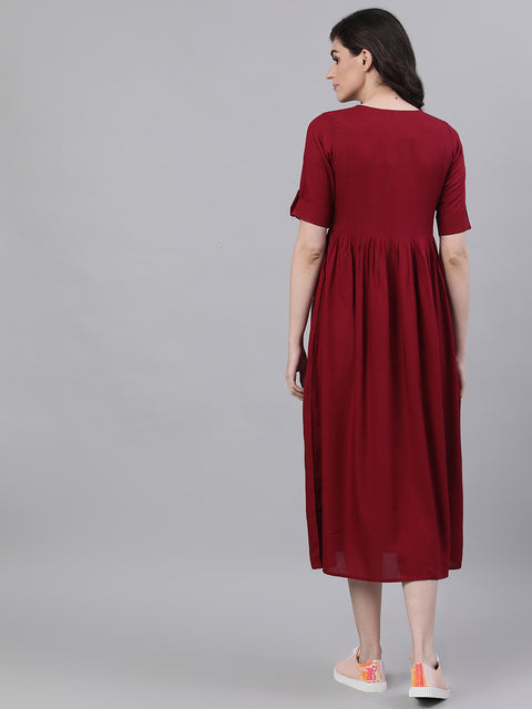 Women Maroon Solid Embroidered Tie-Up Neck Viscose Rayon A-Line Dress