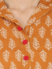 Mustard printed 3/4th sleeve Cotton Kurta with button work at yoke