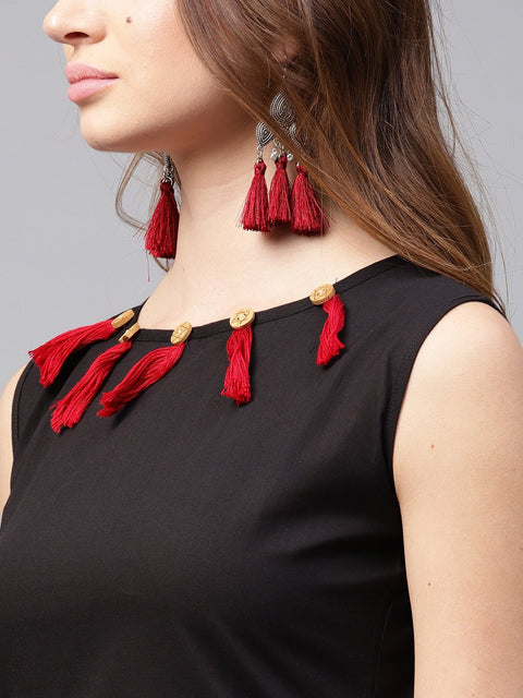 Black sleeveless cotton kurta with green printed flared skirt