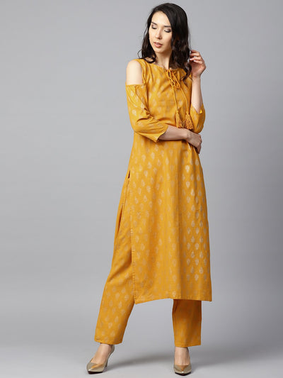 Yellow printed 3/4th sleeve cold shoulder cotton kurta with yellow printed palazzo