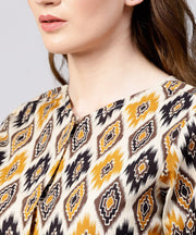 Yellow printed 3/4th sleeve cotton Assymetric tops with striped flared skirt