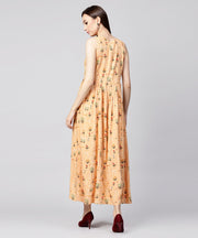 Yellow printed sleeveless rayon A-line maxi dress with button  in Yokr