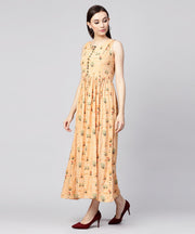 Yellow printed sleeveless rayon A-line maxi dress with button  in Yokr