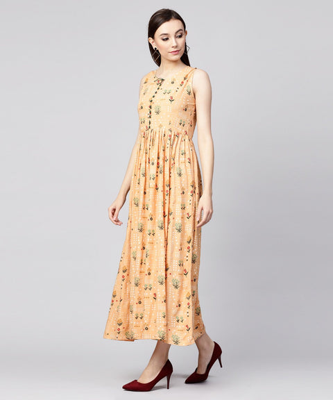 Yellow printed sleeveless rayon A-line maxi dress with button  in Yokr