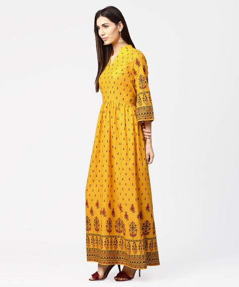 Yellow printed 3/4th flared sleeve cotton maxi dress