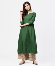 Solid green 3/4th sleeve side gathering cotton kurta with printed pallazo