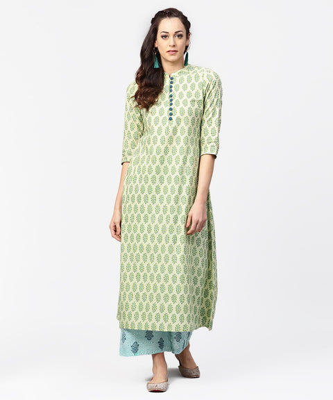 Green printed 3/4th sleeve A-line cotton kurta with blue printed pallzo