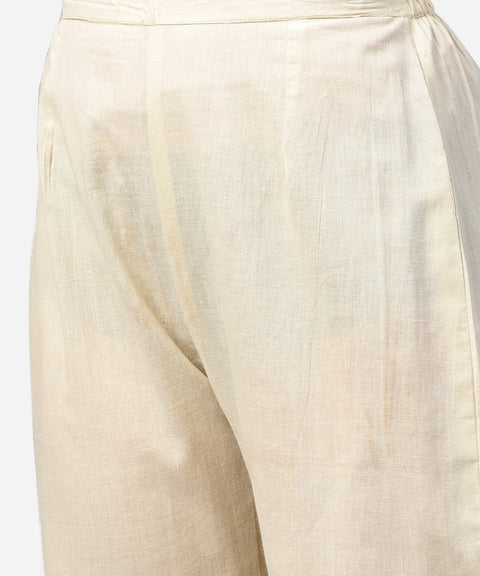 Off white & red printed 3/4th sleeve cotton pleated a-line kurta with beige pallazo