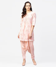 Peach printed 3/4th sleeve pleated kurti with ankle length block printed salwar