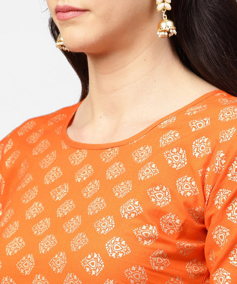 Orange printed 3/4th sleeve cotton kurta with blue printed flared ankle length skirt