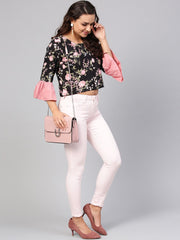 Solid black based multi floral prints with a round neck and flared sleeves