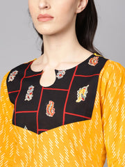 Yellow 3/4th sleeve cotton kurta with navy blue ankle length palazzo