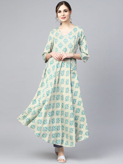 Sage green printed V-neck Angrakha style 3/4th assymetrical sleeve falred kurta with solid pants.