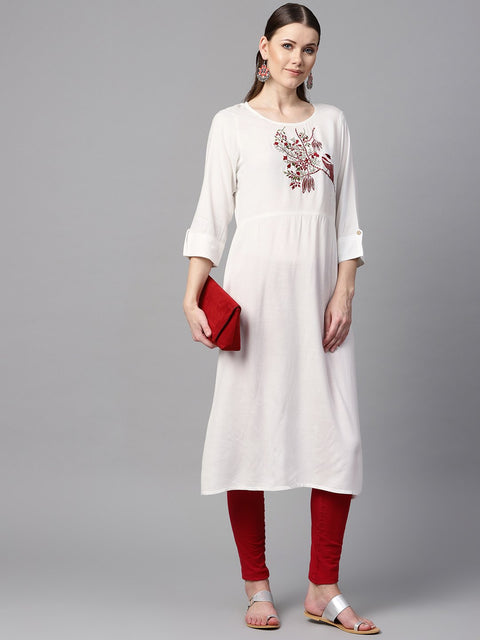 White color solid round neck a-line kurta with embroidered yoke.