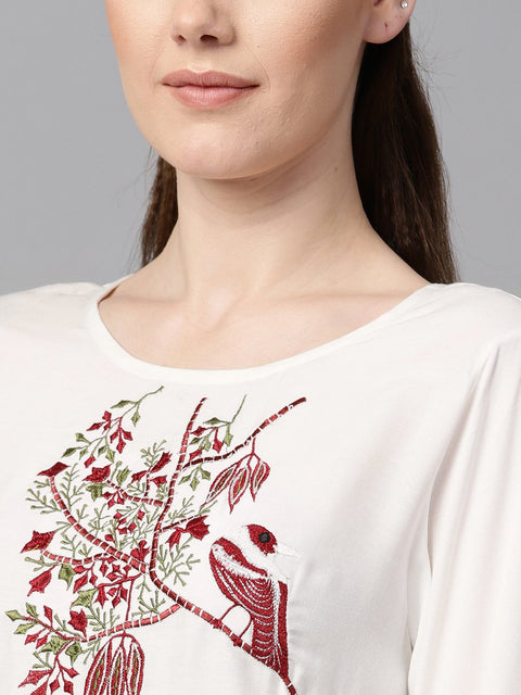 White color solid round neck a-line kurta with embroidered yoke.