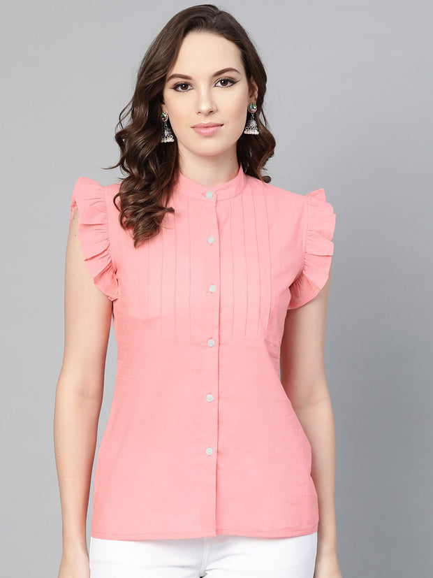 Solid pastel pink tunic with detailed sleeves
