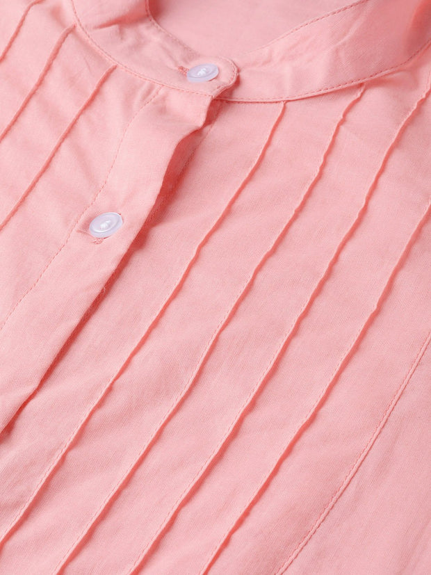 Solid pastel pink tunic with detailed sleeves