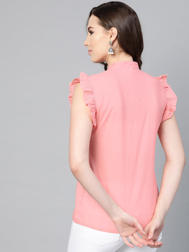 Solid pastel pink tunic with detailed sleeves