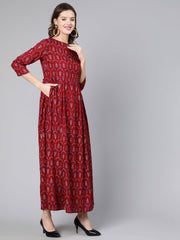 Women Maroon Printed Flared Dress With Three Quarter Sleeves