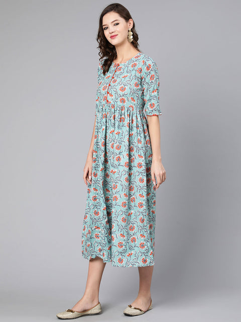 Women Green Floral Printed Flared Dress With Three Quarter Sleeves