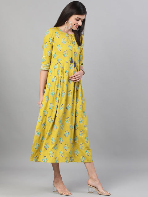 Women Green Printed Round Neck Viscose Rayon Fit and Flare Dress with pockets