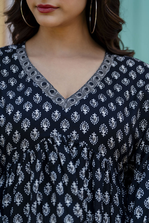 Women Black Printed V-Neck Peplum Top